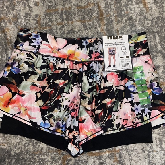 Reebok Pants - Reebok running floral shorts size Large